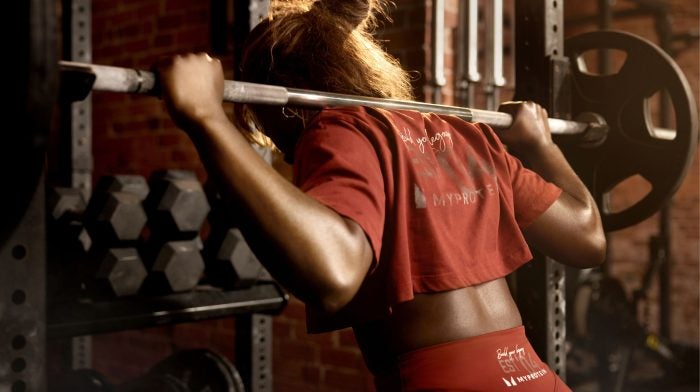 woman lifting heavyweight