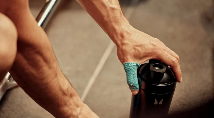 man holding a shaker